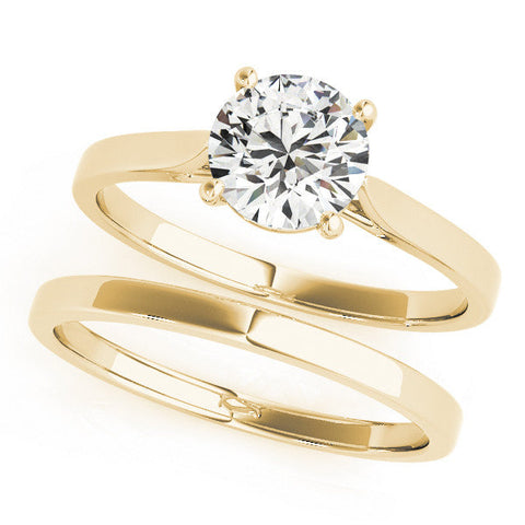 Yellow gold Round Solitaire Diamond Ring with Four-Prong Setting and Tapered Band