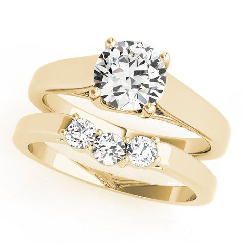 Yellow gold Round Solitaire Engagement Ring with Tapered Band and Four-Prong Setting