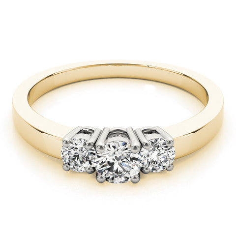 Yellow gold Three-Stone Round Diamond Solitaire Ring with Channel Set Band and Four-Prong Setting
