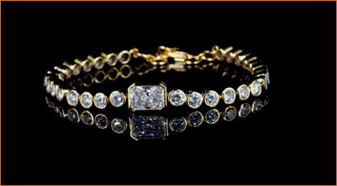 Yellow gold Bezel-Set Round Diamond Tennis Bracelet with Radiant Center Diamond